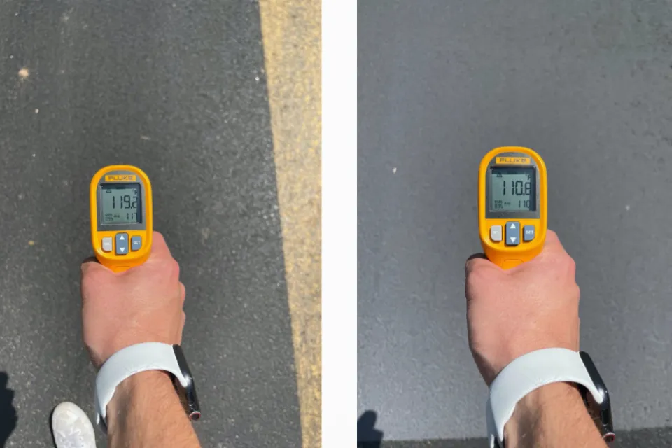 Side-by-side photos of hand holding thermometer above pavement; left photo shows 119 degrees, right photo shows 110 degrees, illustrating the effect of a cool pavement treatment.